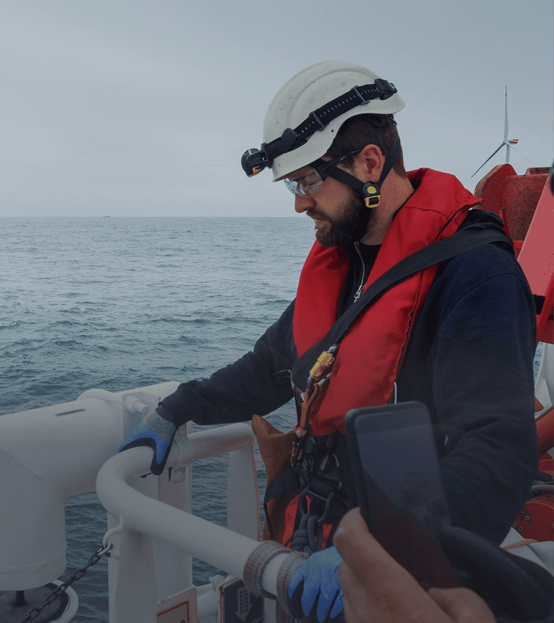 Person wearing helmet and life jacket