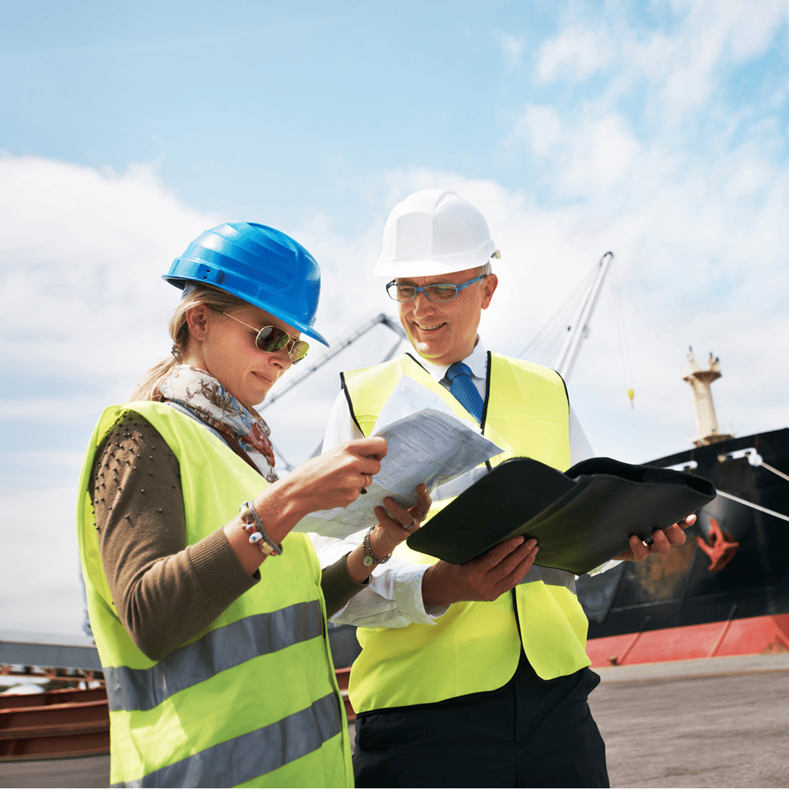 Port workers discussing logistics